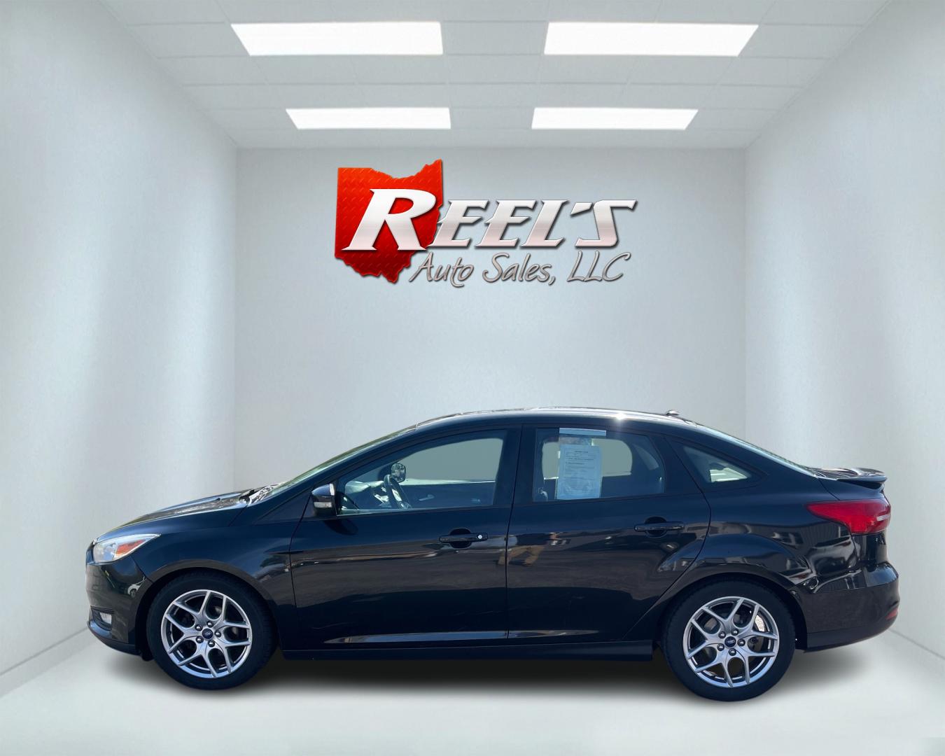 2015 Black /Black Ford Focus SE Sedan (1FADP3F27FL) with an 2.0L I4 DOHC 16V engine, 6-Speed Automatic transmission, located at 11115 Chardon Rd. , Chardon, OH, 44024, (440) 214-9705, 41.580246, -81.241943 - Photo#9